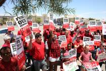 Members and supporters of the Clark County Education Association protest in front of Durango Hi ...