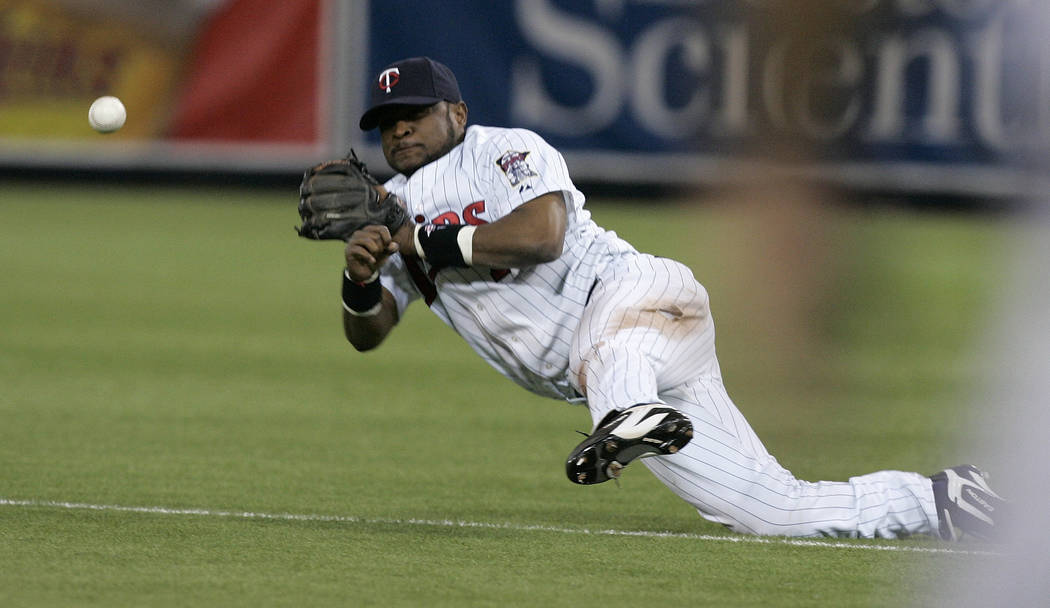 FILE - In this June 12, 2007 file photo, Minnesota Twins second baseman Luis Castillo makes an ...