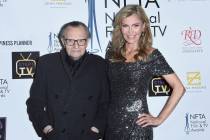 FILE - In this Dec. 5, 2018 file photo Larry King, left, and Shawn King attend the 2018 Nationa ...