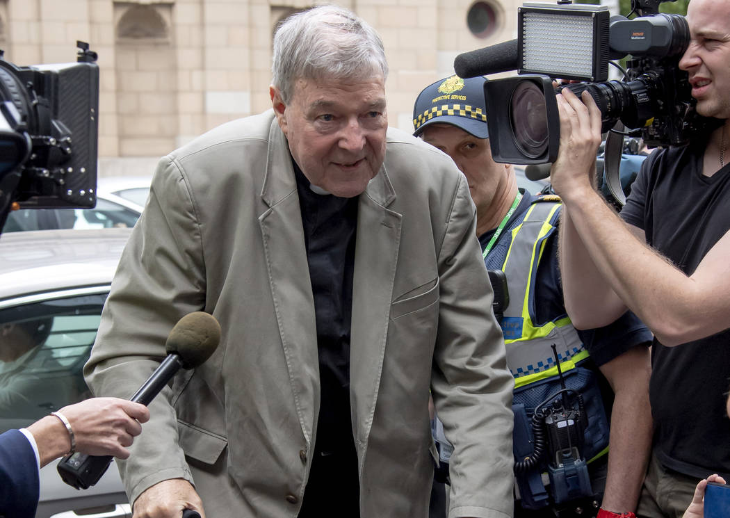 In this Feb. 26, 2019, photo, Cardinal George Pell leaves the County Court in Melbourne, Austra ...