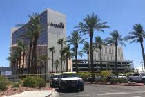 Las Vegas police guard the perimeter of Aquarius Casino in Laughlin after an officer-involved s ...