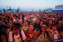 Fans react as French Montana performs at the Downtown stage during the first day of the annual ...