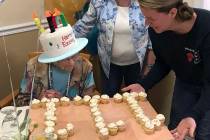 In this photo provided by Tony Venti, Hazel Nilson celebrates her 111th birthday with peach cup ...