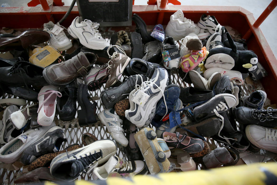 Shoes that were found inside the walls at the former Sears store at the Boulevard Mall in Las V ...