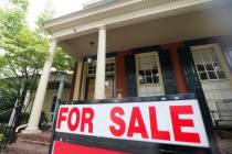 In an Aug. 16, 2019, file photo a for sale signs beckon buyers to homes along Park Avenue in Ri ...