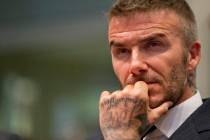 David Beckham listens during a public hearing for his proposed Major League Soccer stadium and ...