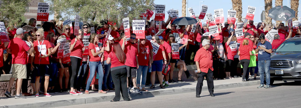 Teachers protest after stalled contract negotiations before a Clark County School District boar ...