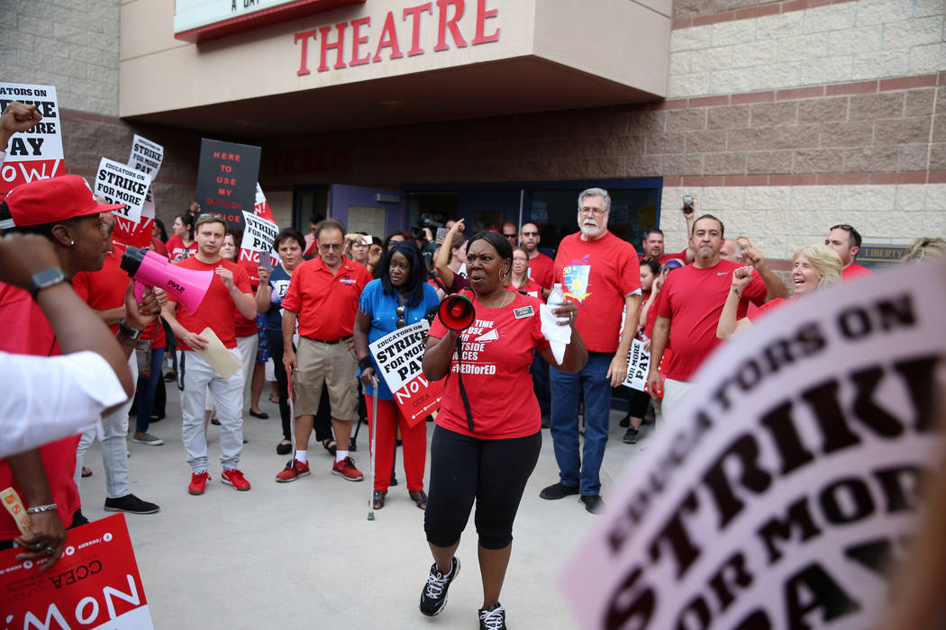 Linda Jones of Clark County Education Association, center, rallies the crowd after a Clark Coun ...