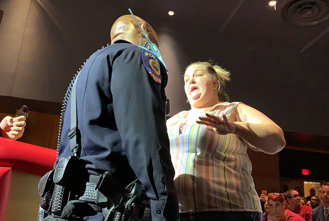 Kimberly Fillmore, parent of two CCSD students, becomes emotional during the board meeting Thur ...