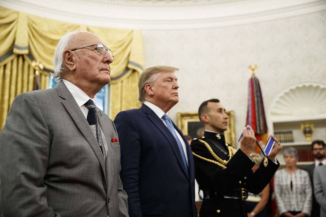 President Donald Trump stands during a Presidential Medal of Freedom ceremony for former NBA ba ...