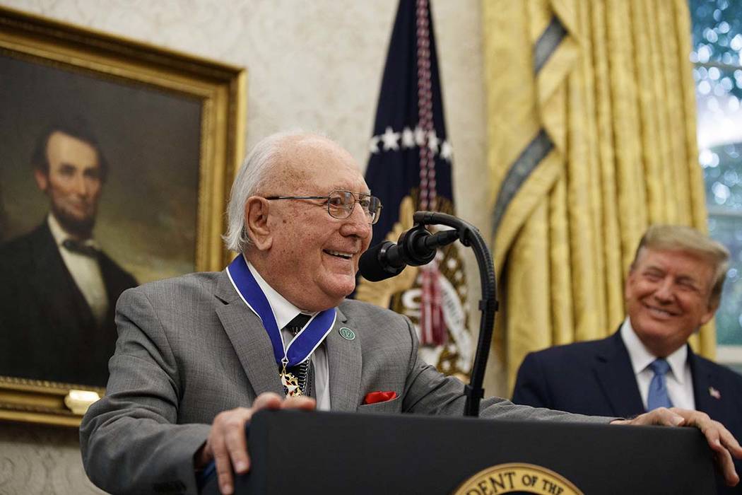 Former NBA basketball player and coach Bob Cousy, of the Boston Celtics, speaks as President Do ...