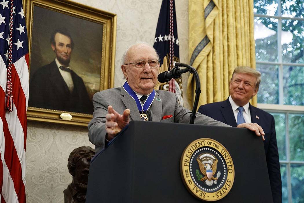 President Donald Trump listens during a Presidential Medal of Freedom ceremony for former NBA b ...