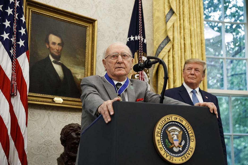 President Donald Trump listens during a Presidential Medal of Freedom ceremony for former NBA b ...