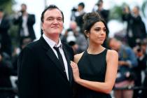FILE - In this May 18, 2019 file photo, film director Quentin Tarantino and his wife Daniela Pi ...