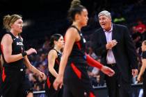 Las Vegas Aces coach Bill Laimbeer, right, talks with his team during the first half of a WNBA ...