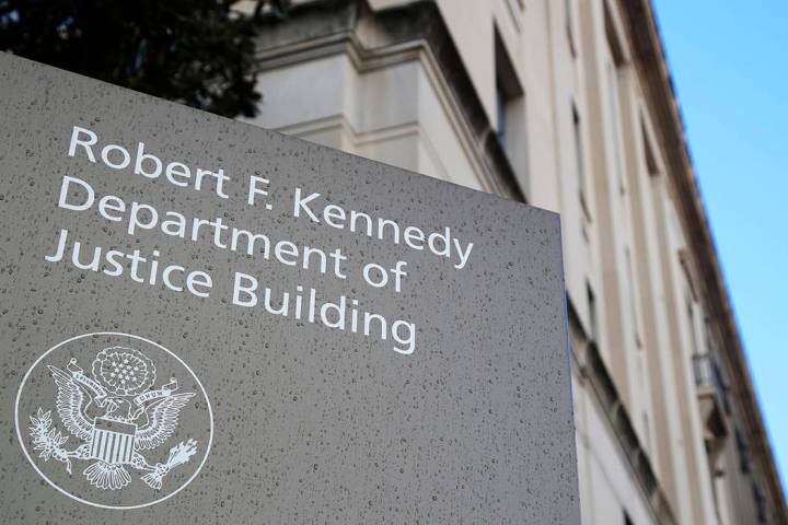 FILE - This Friday, March 22, 2019, file photo shows the Department of Justice Building in Wash ...