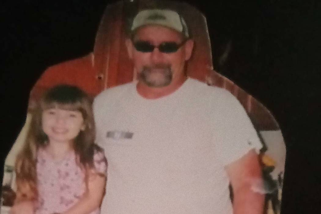 Steven Colburn poses with his oldest granddaughter in an undated photo. Colburn, 59, was fatall ...