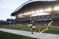 Oakland Raiders' Keisean Nixon (38) celebrates after knocking away a pass in the "end zone" int ...