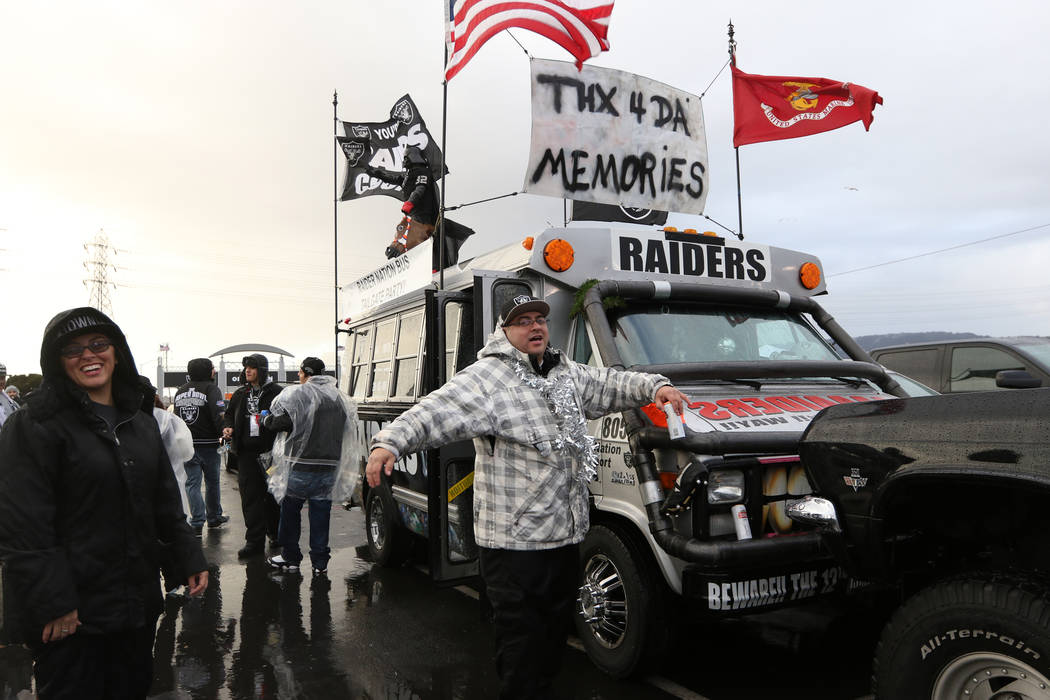 Andy Coronado shows off the fan bus he drove from Stockton, Calif., to tailgate in before what ...