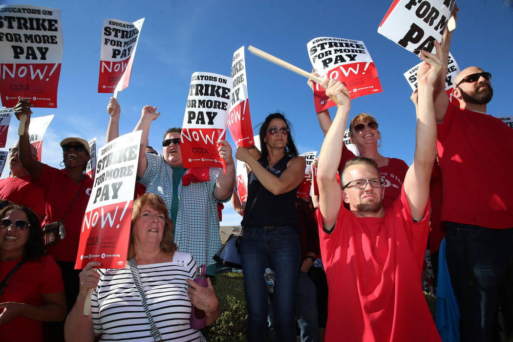 Teachers protest after stalled contract negotiations before a Clark County School District boar ...