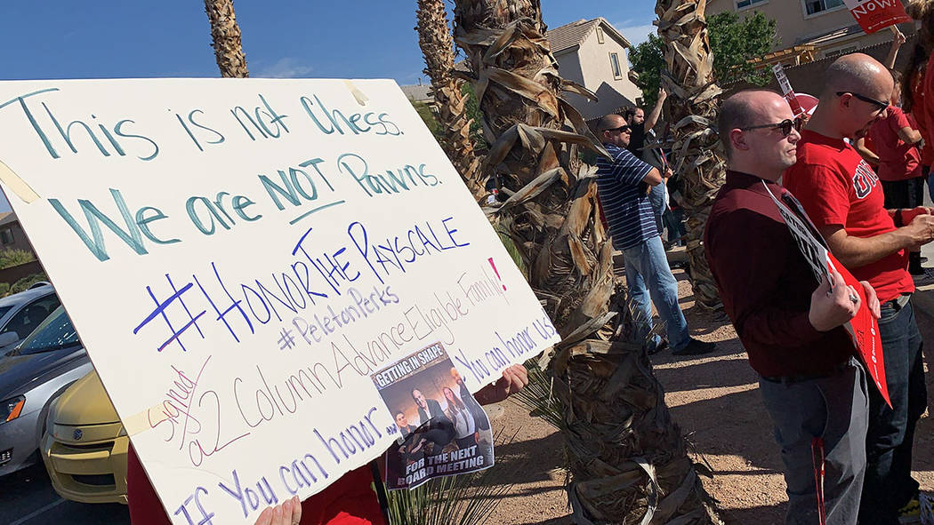 Clark County teachers and their supporters hold a rally outside Liberty High School in Las Vega ...