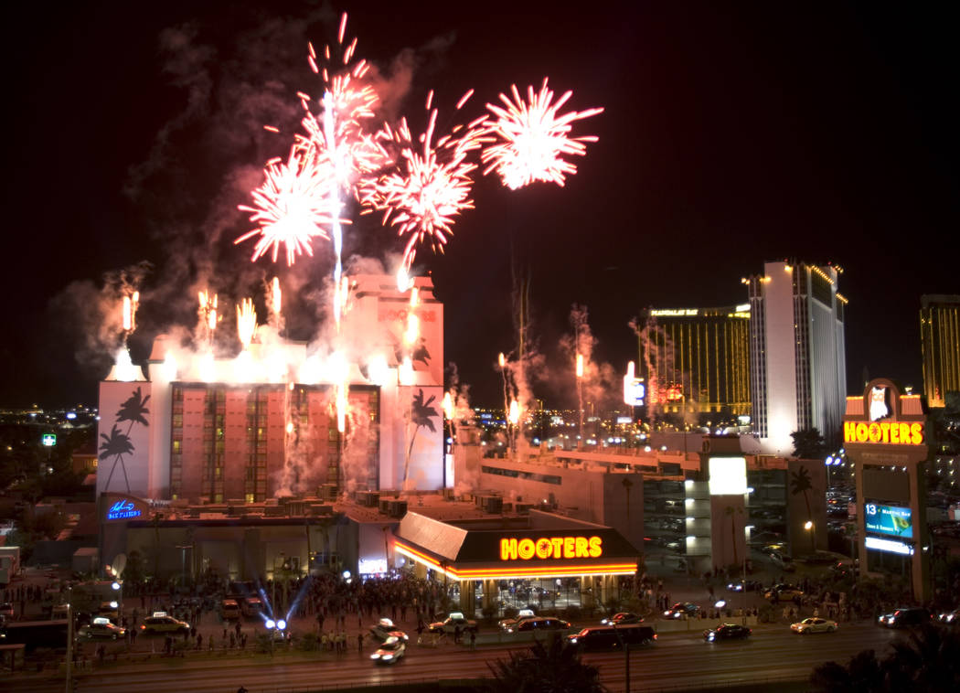 In this Feb.2, 2006, file photo, fireworks explode off the roof of the new Hooters Casino in th ...