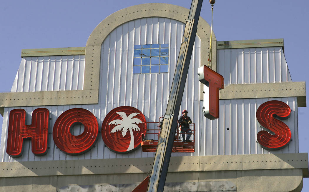 In this Feb. 1, 2006, file photo, the letters for the new marquee are raised into place at the ...