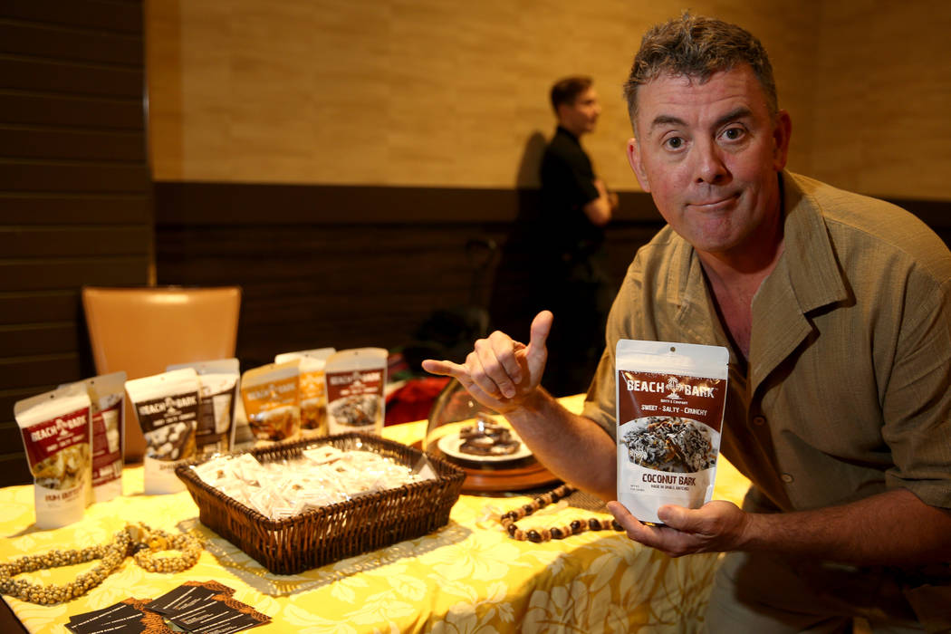 Christopher Campbell of The Beach Bark Brittle Company at his booth before the Start Tank entre ...