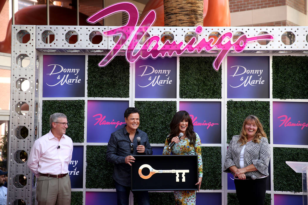 Strip headliners Donny and Marie Osmond receive a Key to the Strip as Caesars Entertainment CEO ...