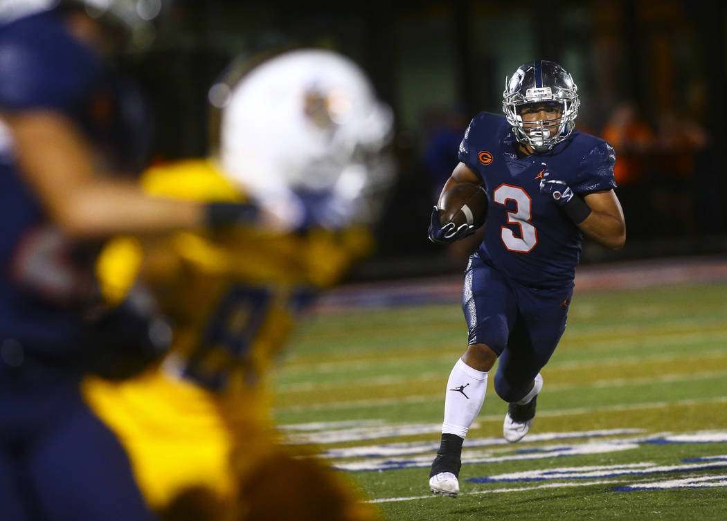 Bishop Gorman's running back Cam Barfield runs the ball against Orem during the second half of ...