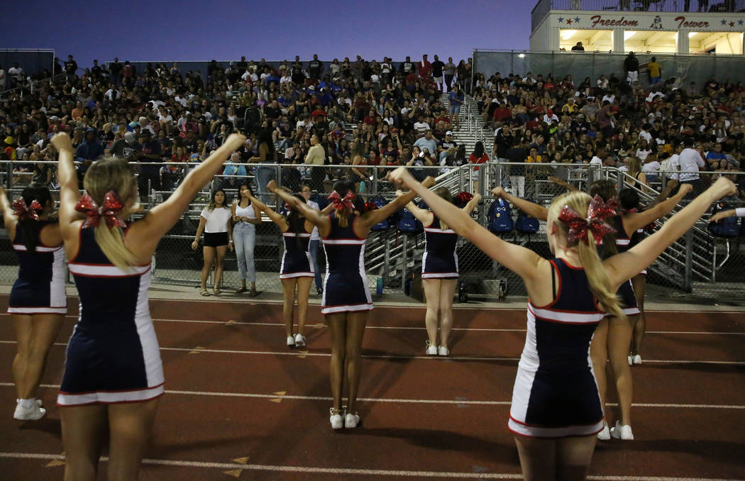 The Liberty High school cheerleaders perform during a football game against Chandler, Ariz., Hi ...