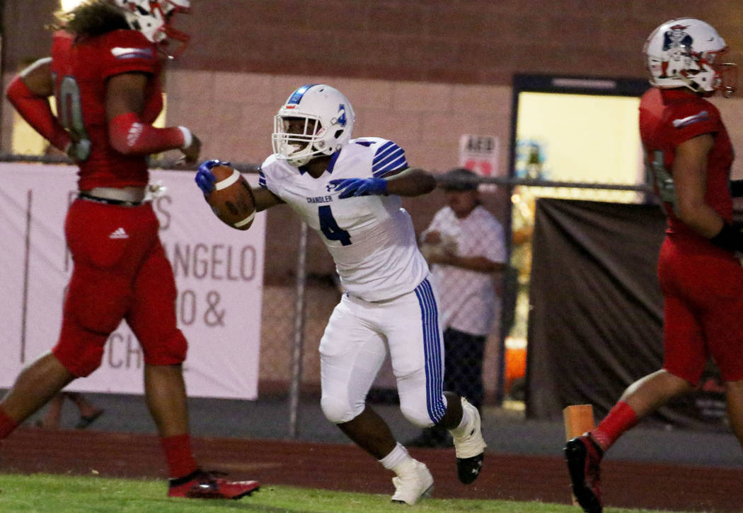 Chandler, Ariz., High's Dae Dae Hunter celebrates his touchdown during the first half of their ...