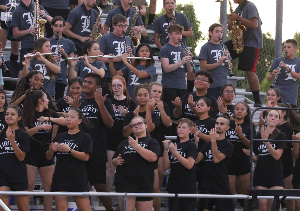 The Liberty High marching band perform during a football game against Chandler, Ariz., High Sch ...