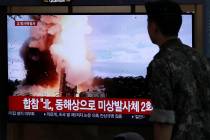 A South Korean soldier watches a TV screen showing a news program reporting about North Korea's ...