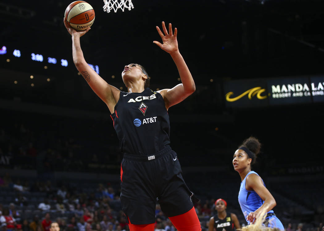 Las Vegas Aces center Liz Cambage goes to the basket against the Atlanta Dream during the first ...