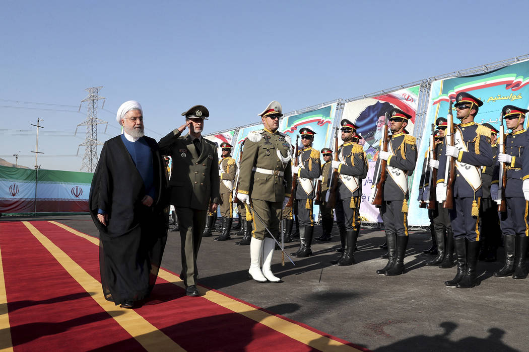 In this photo released by the official website of the office of the Iranian Presidency, Preside ...