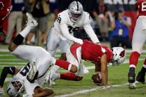 Arizona Cardinals quarterback Kyler Murray (1) is tackled in the end zone for a safety by by Oa ...