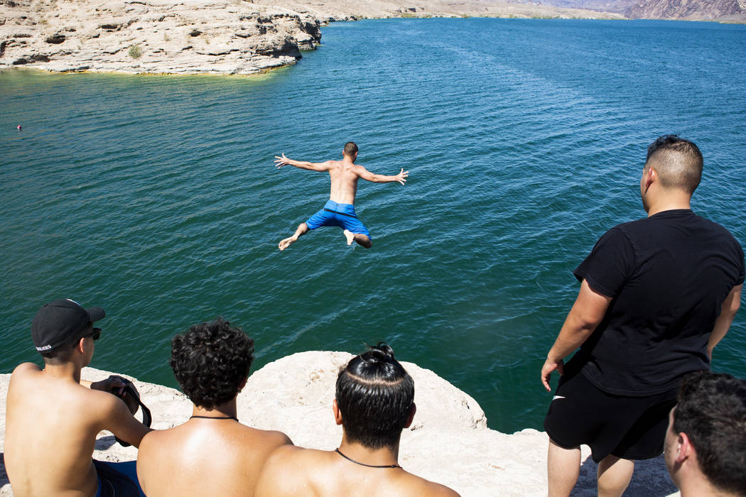 Matt from Las Vegas, who choose not to give this last name, jumps high into Lake Mohaveʡt ...
