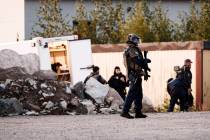 Police investigate an incident in an industrial area near Porvoo, Finland, early Sunday Aug. 25 ...