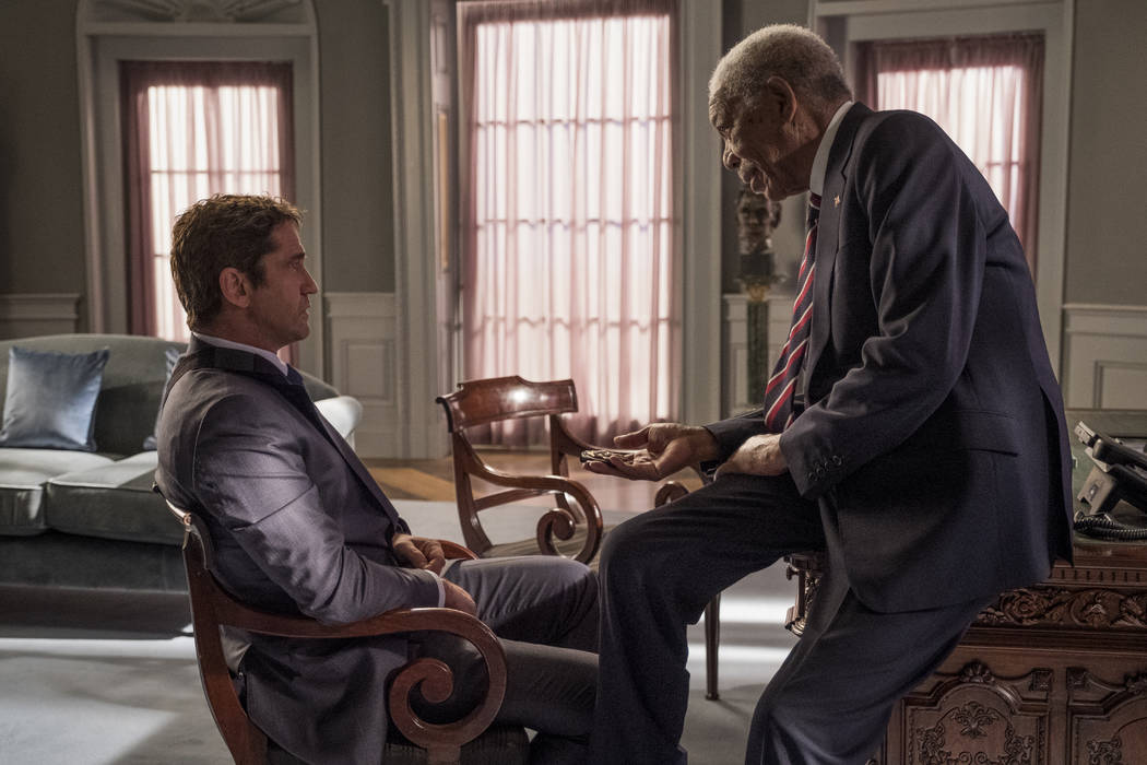 This image released by Lionsgate shows Gerard Butler, left and Morgan Freeman in "Angel Ha ...