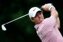 Rory McIlroy hits from the tee on the 11th hole during third-round play in the Tour Championshi ...