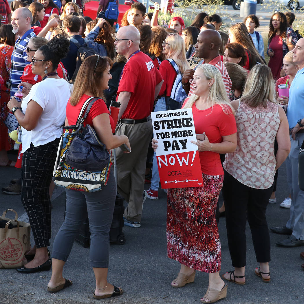 Teachers and administrators at Spring Valley High School staged a protest to demand appropriat ...