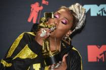 Missy Elliott poses in the press room with the Video Vanguard award at the MTV Video Music Awar ...