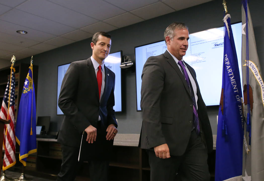 Nevada US Attorney Nicholas Trutanich, left, and Ray Johnson, assistant special agent in charge ...