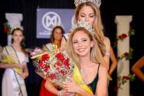 Kyndall Garza receives the crown for Miss World America - Nevada 2019 from Marisa Paige Butler, ...
