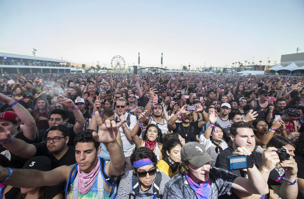 The crowd at the Downtown Stage erupts at the sight of 2 Chainz during the first day of the Lif ...