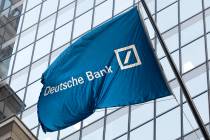 FILE - In this Oct. 7, 2016, file photo a flag for Deutsche Bank flies outside the German bank' ...