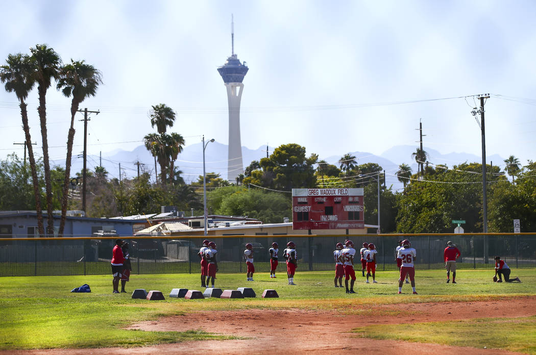 Players during football practice at the baseball field at Valley High School in Las Vegas on We ...