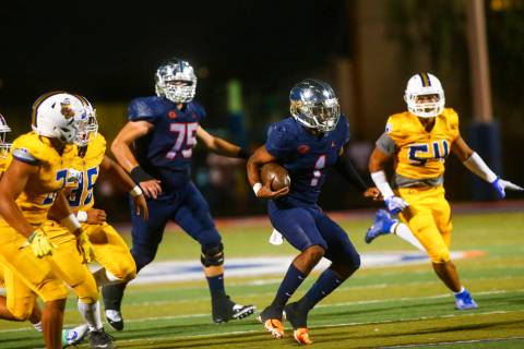 Bishop Gorman's Micah Bowens (1) runs the ball against Orem during the second half of a footbal ...