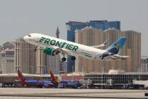 A Frontier Airlines flight departs McCarran International Airport in Las Vegas, June 26, 2019. ...